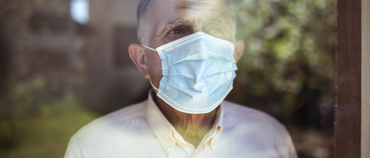 Older man wearing a mask