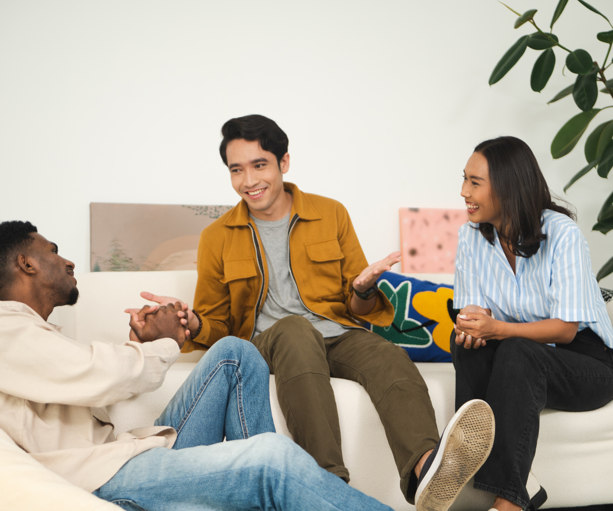 A photo of a group of people chatting